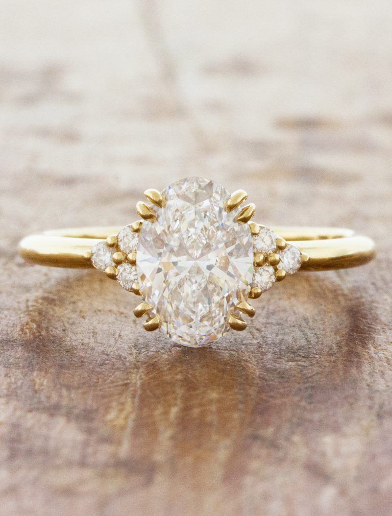 caption:Shown with 1.8ct oval diamond in 14k yellow gold