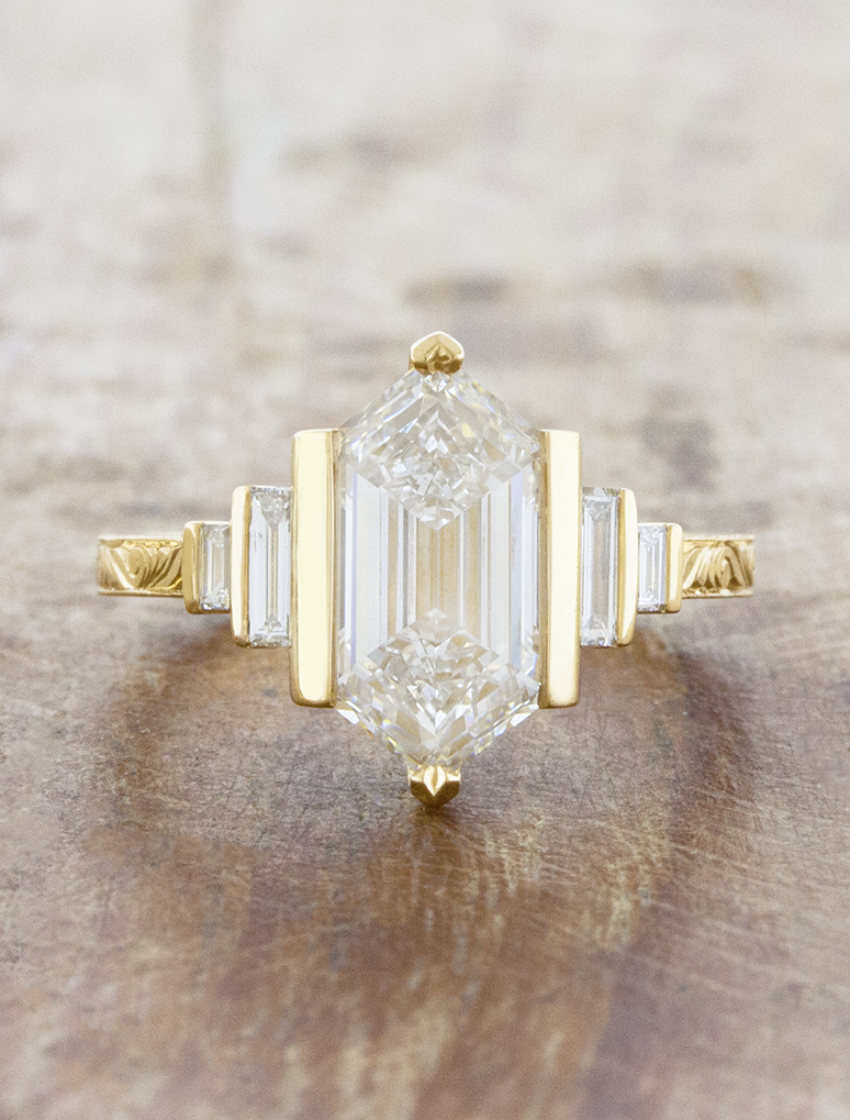 caption:Shown with 3ct hexagon diamond in 18k yellow gold 