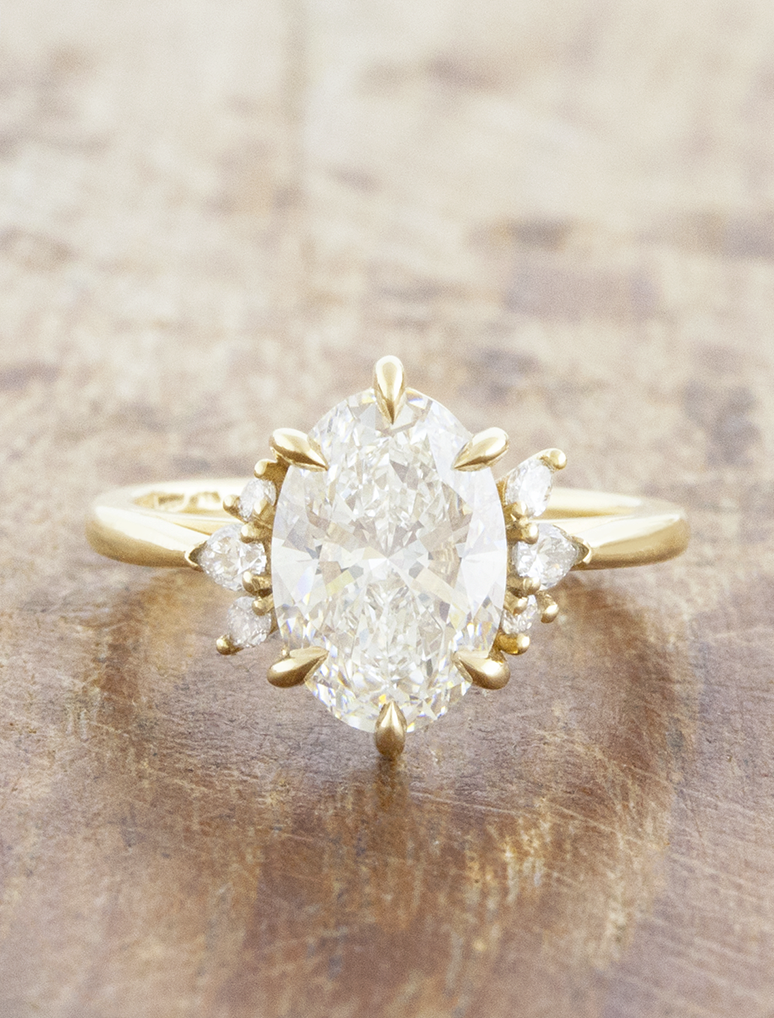 caption:Shown with 2.28ct oval in 14k yellow gold 