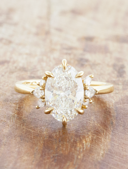 caption:Shown with 2.28ct oval in 14k yellow gold 