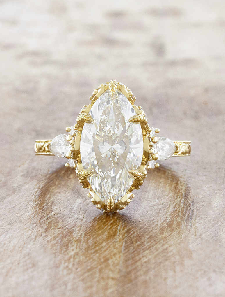 caption:Shown with 3.5ct marquise in 14k yellow gold 