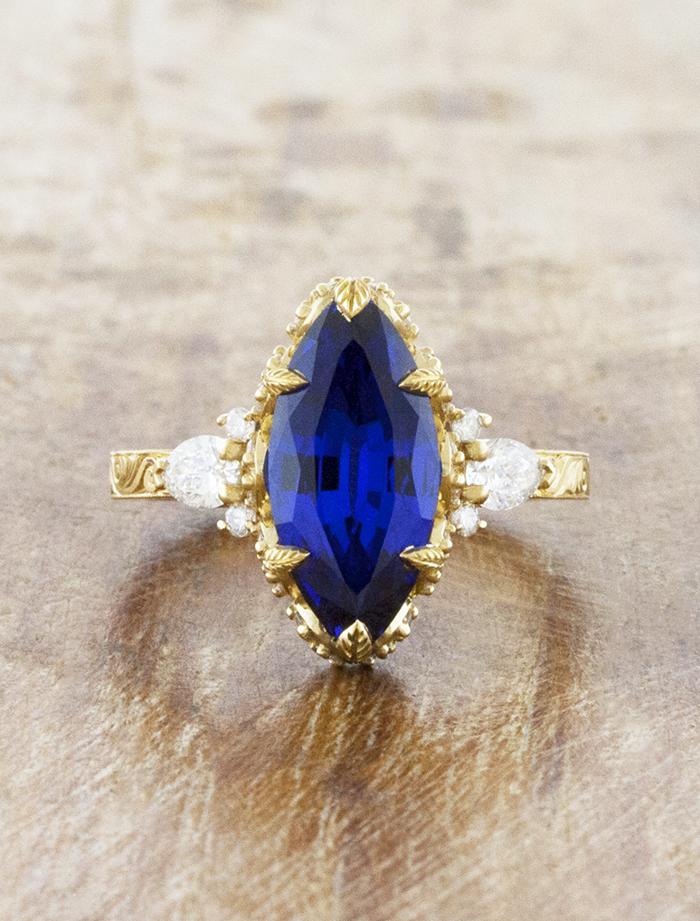 caption:Shown with 15 x 7mm marquise sapphire in 14k yellow gold