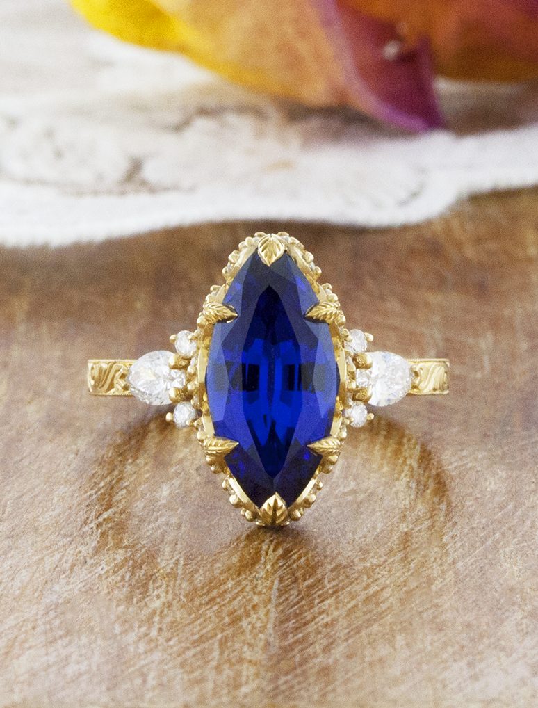 caption:Shown with 15 x 7mm marquise sapphire in 14k yellow gold