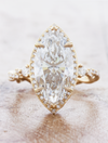 caption:Shown with 4ct marquise diamond in 14k yellow gold