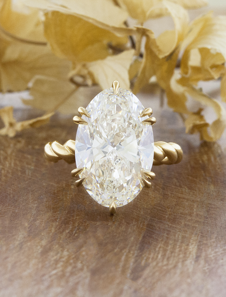 caption:Shown with 7ct oval in 18k yellow gold