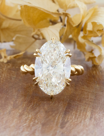 caption:Shown with 7ct oval in 18k yellow gold