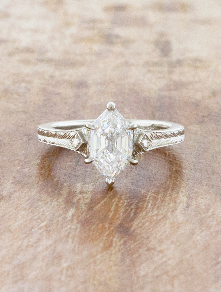 caption:Shown with 1.5ct step cut dutch marquise in platinum 