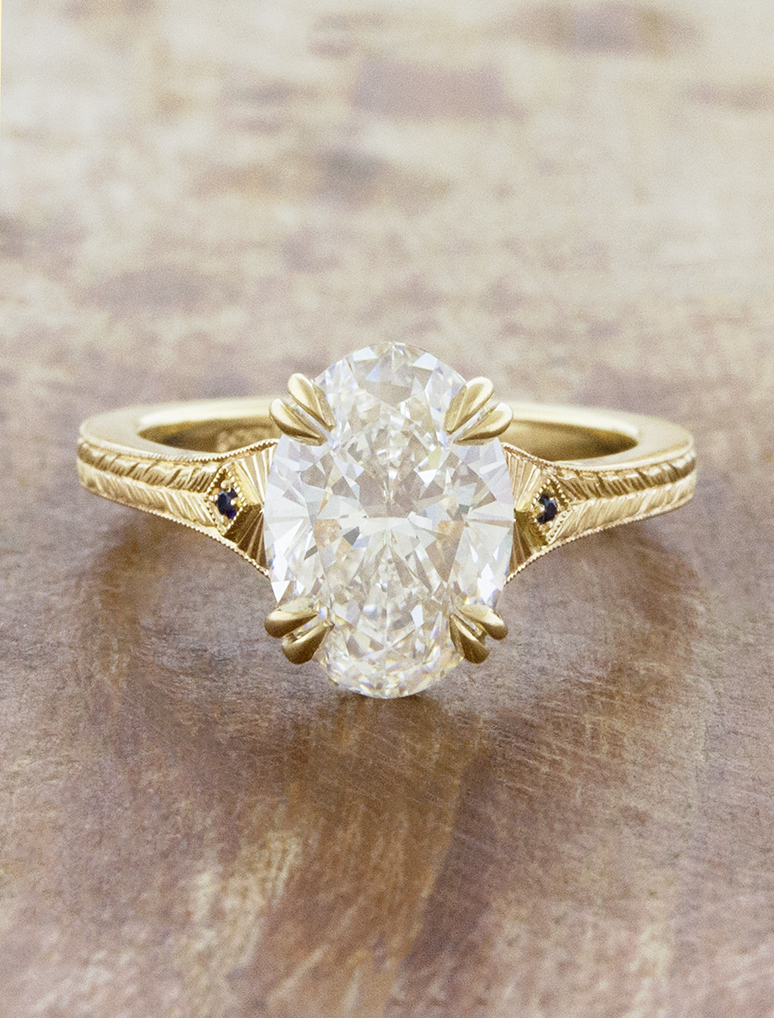 caption:Shown with 2.5ct oval in 14k yellow gold