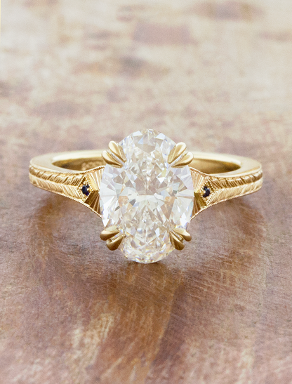 caption:Shown with 2.5ct oval in 14k yellow gold