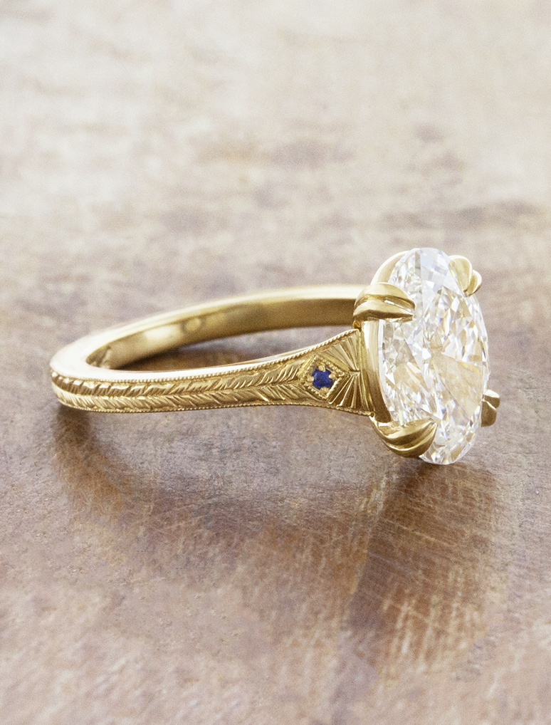 caption:Designed with blue sapphire accents