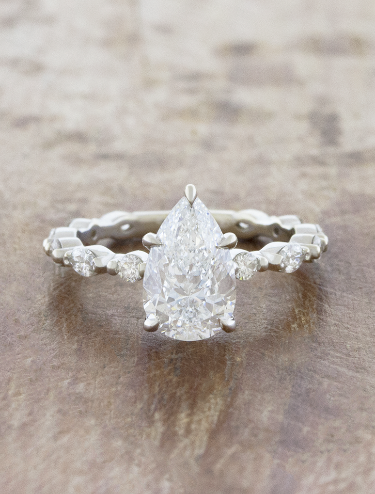 caption:Shown with 1.7ct pear in 14k white gold 