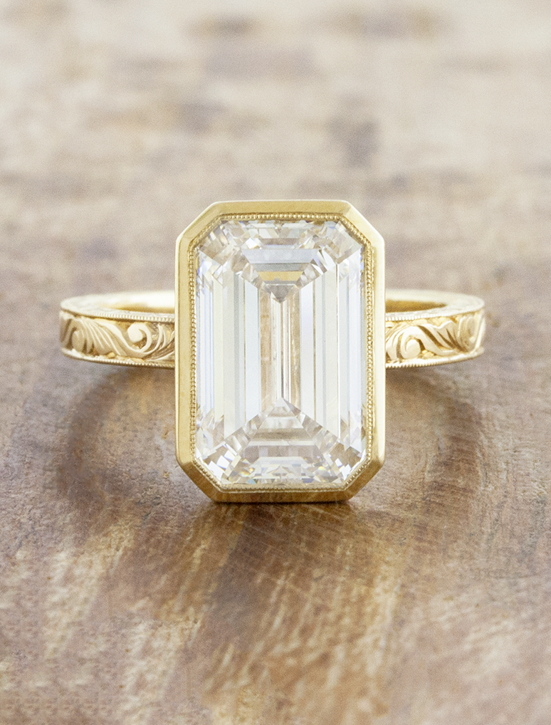 caption:Shown with 4ct emerald cut in 14k yellow gold