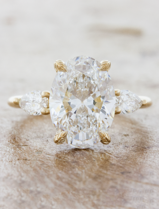 caption:Shown with 3.0ct oval diamond in 14k yellow gold