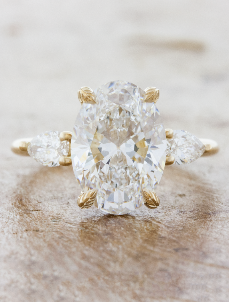 caption:Shown with 3.0ct oval diamond in 14k yellow gold