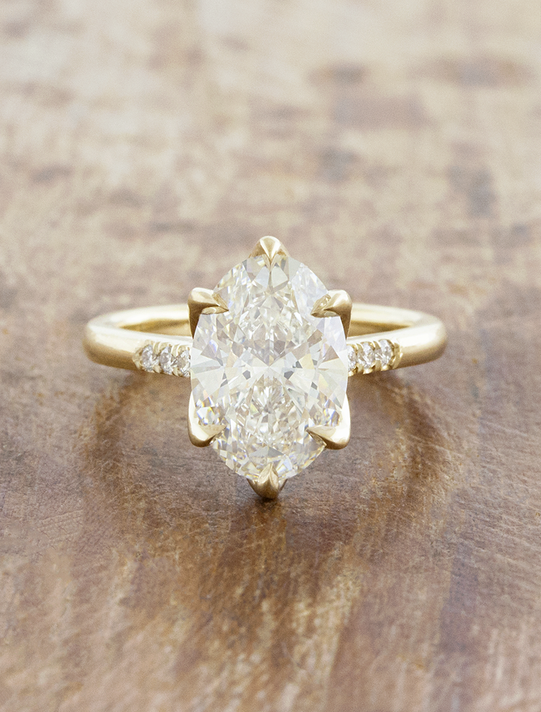 caption:Shown with 2.5ct oval in 14k yellow gold