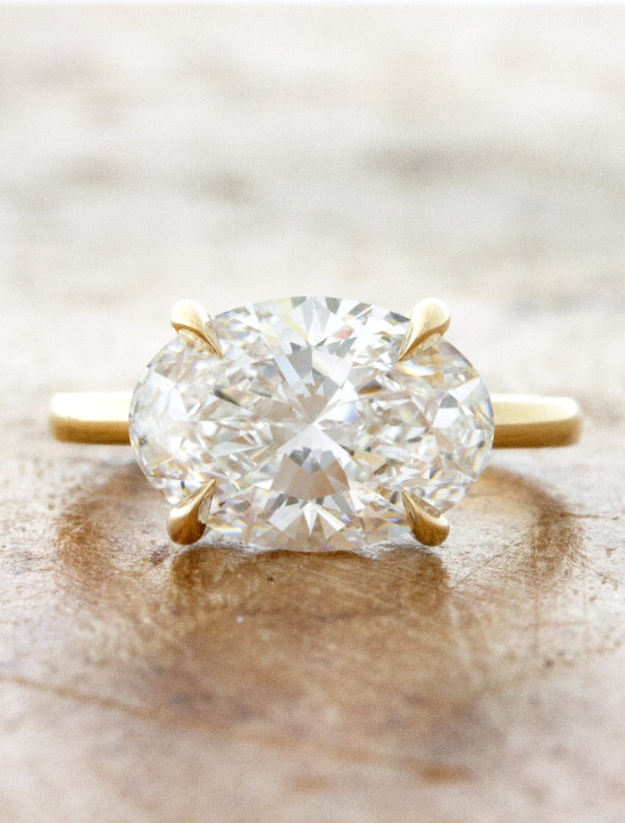 caption:Shown with 3ct oval diamond in 14k yellow gold