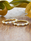 caption:Customized with leaf engraved prongs