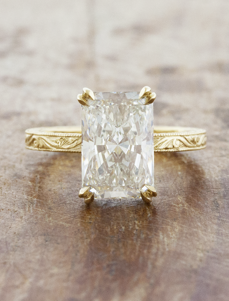 caption:Shown with 3ct radiant cut in 14k yellow gold