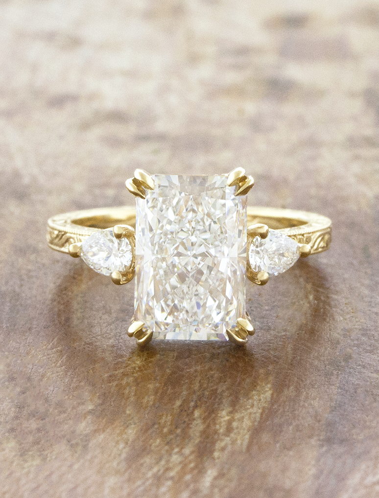 caption:Shown with 3.5ct radiant cut in 14k yellow gold 