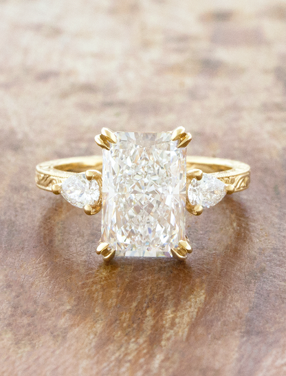 caption:Shown with 3.5ct radiant cut in 14k yellow gold 