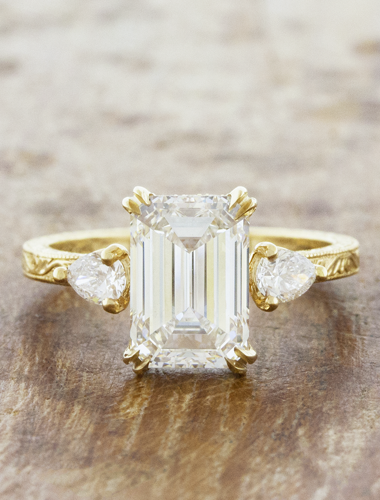 caption:Shown with 3ct emerald cut diamond in 14k yellow gold