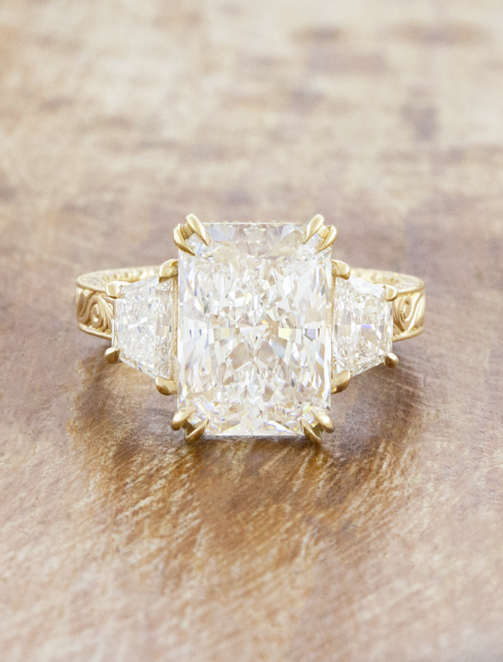 caption:Shown with 4.5ct radiant cut in 14k yellow gold 
