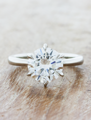 caption:2ct round diamond in a 6-prong setting