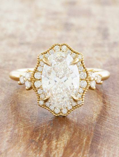 caption:Shown with 2ct oval diamond in 14k yellow gold 