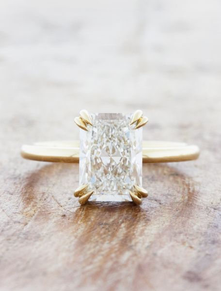 Radiant cut solitaire engagement ring