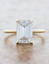 caption:Shown with 2.75ct emerald cut diamond in 14k yellow gold