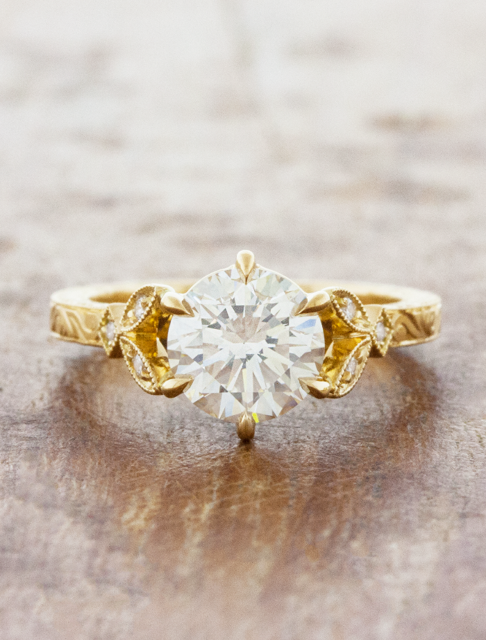 caption:Shown with 1.5ct round diamond in 18k yellow gold