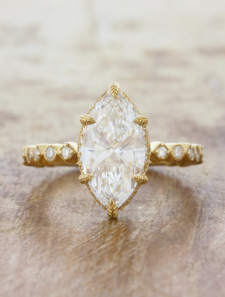 caption:Shown with 2ct marquise in 14k yellow gold 