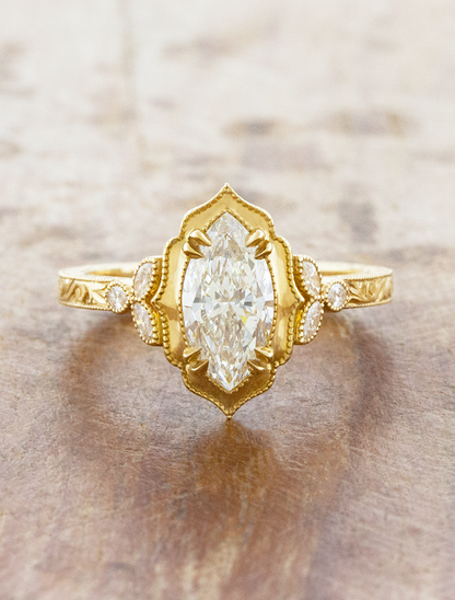 caption:Shown with 1.2ct marquise in 18k yellow gold 