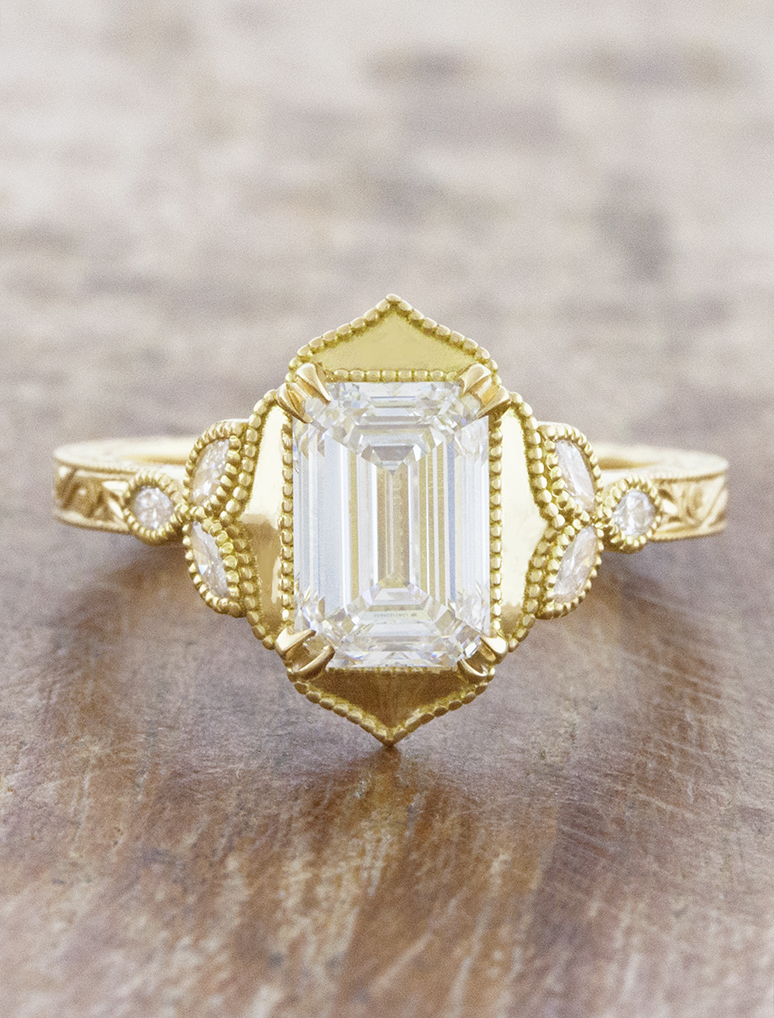 caption:Shown with 1.5ct emerald cut diamond in 18k yellow gold 