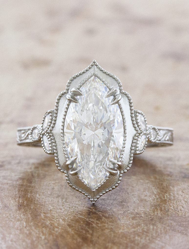 caption:Shown with 2.5ct marquise in platinum