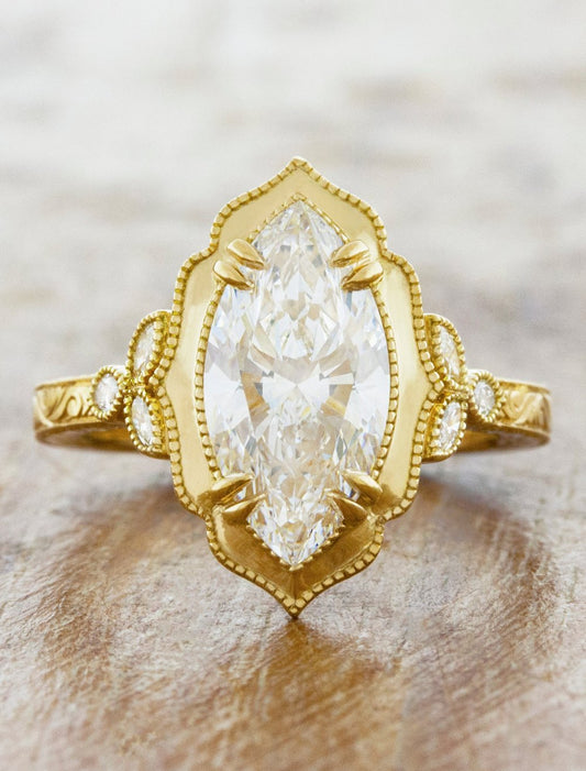 caption:Shown with 2ct marquise diamond in 18k yellow gold