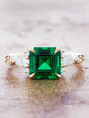 caption:Shown with 1.5ct asscher cut emerald in 14k yellow gold