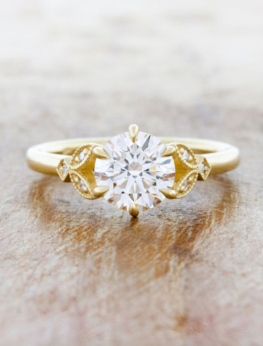caption:Shown with 1.2ct round diamond in yellow gold
