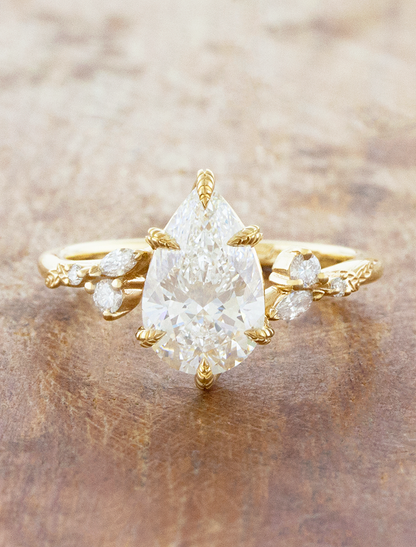 caption:Shown with 2ct pear in 14k yellow gold 
