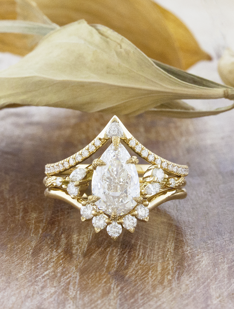 caption:Shown with 1.5ct pear in 18k yellow gold