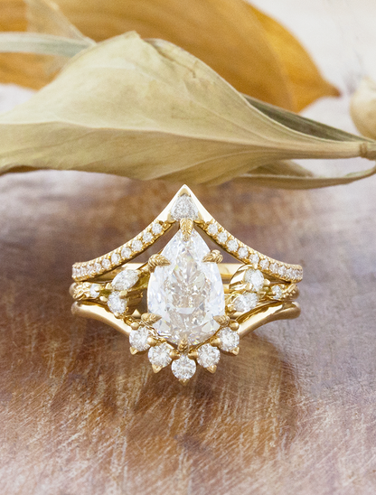 caption:Shown with 1.5ct pear in 18k yellow gold