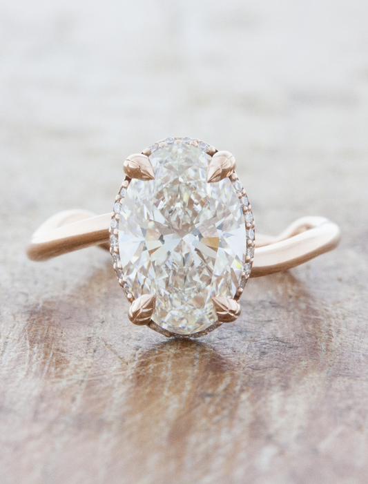 caption:Shown with 2.40ct oval diamond in platinum