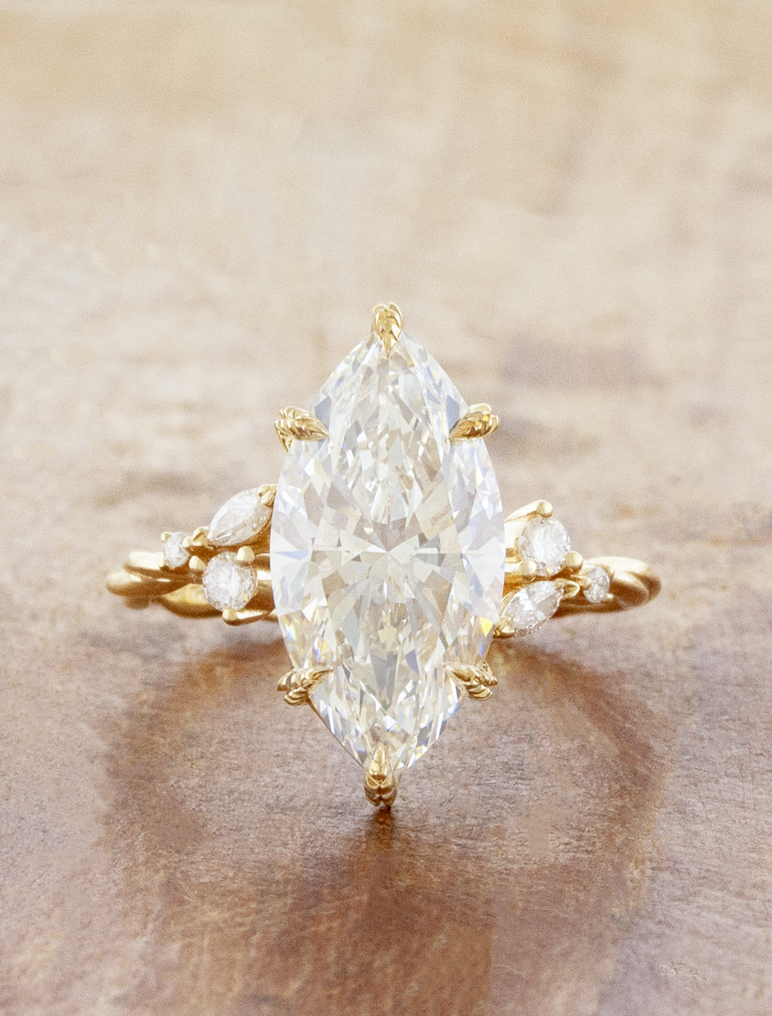 caption:Shown with 3.5ct marquise in 14k yellow gold