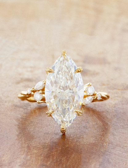 caption:Shown with 3.5ct marquise in 14k yellow gold