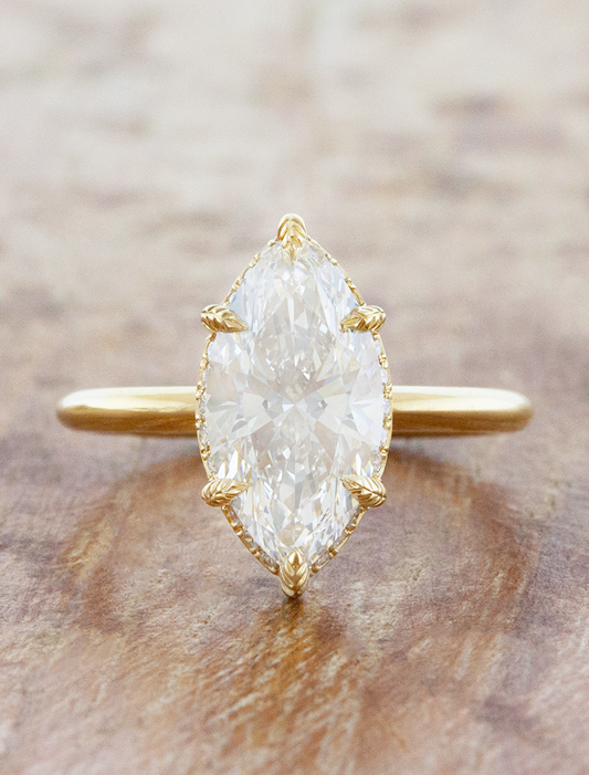 caption:Shown with 2.5ct marquise diamond in 14k yellow gold 