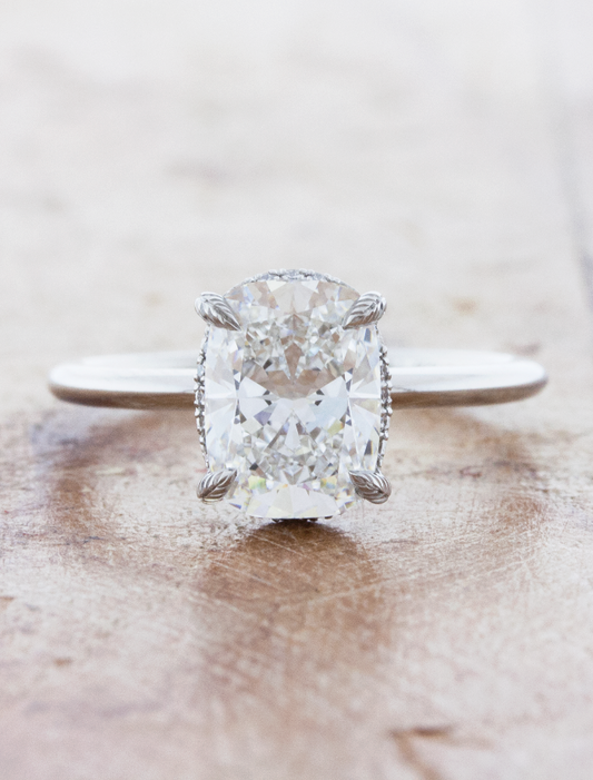 caption:Shown iwth 2.50ct cushion cut diamond in platinum