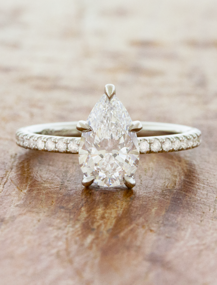 caption:Shown with 1.5ct pear diamond in platinum