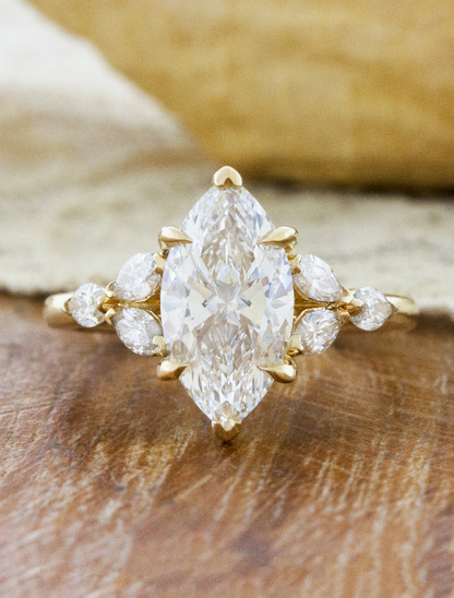 caption:Shown with 1.7ct marquise diamond in 14k yellow gold