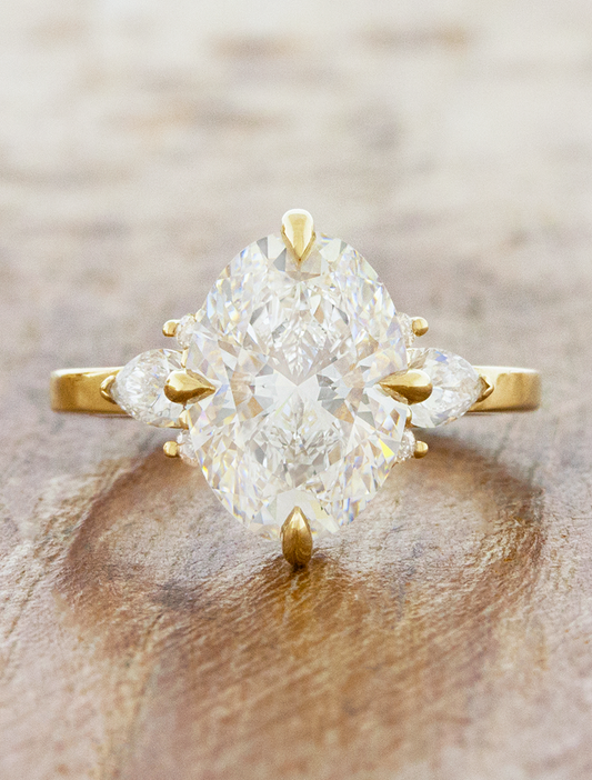 caption:Shown with 3ct oval diamond in 14k yellow gold