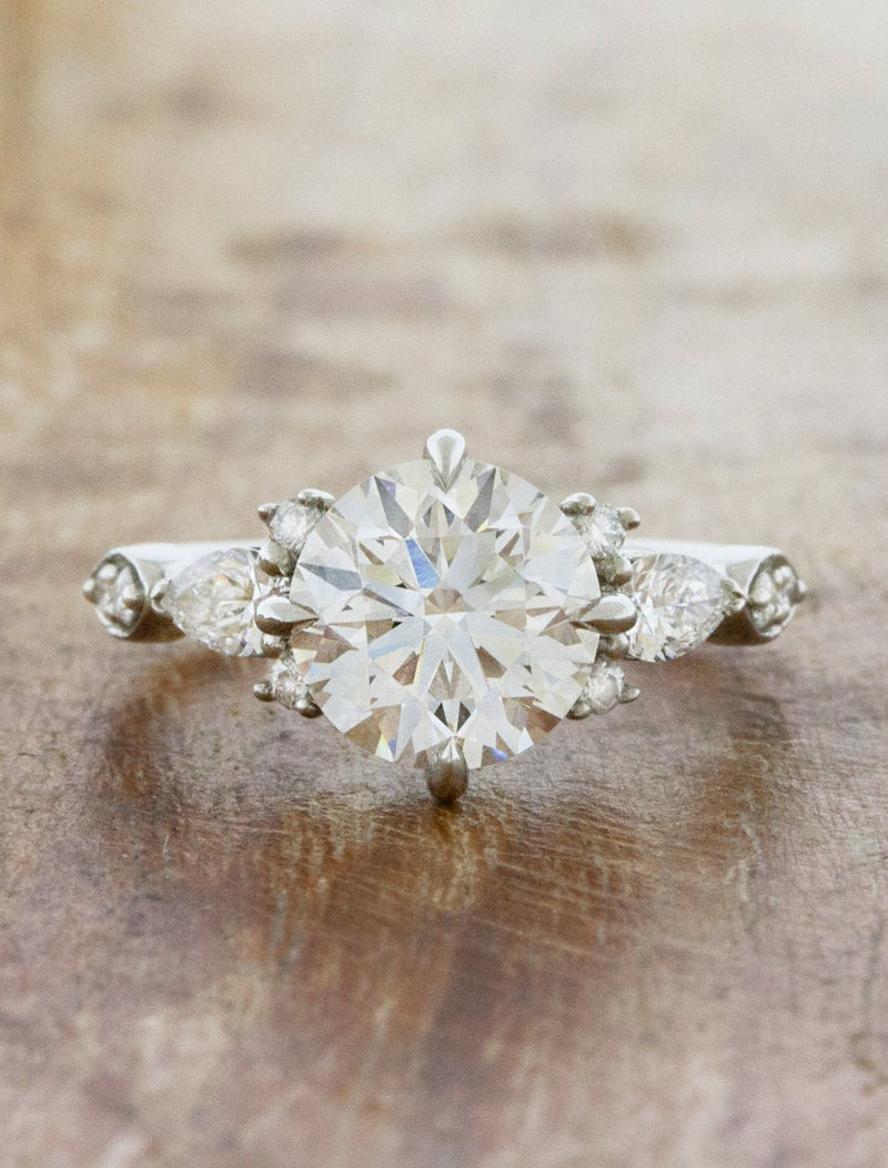 caption:Shown with 2ct round diamond